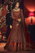 Woman in a traditional embroidered outfit with a decorative background